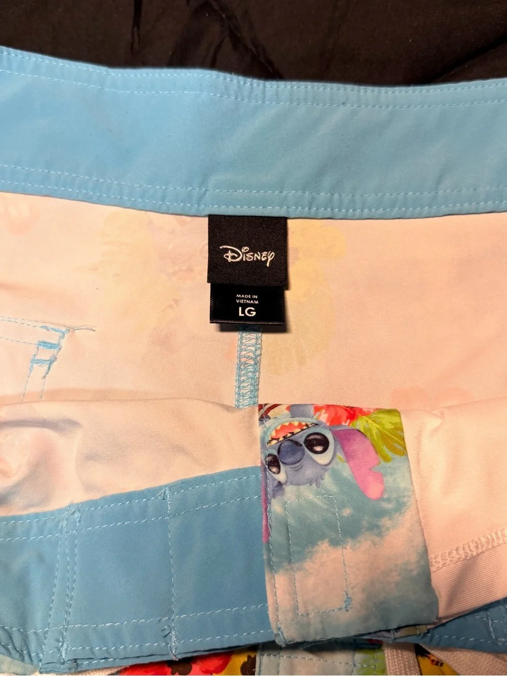 Disney Lilos and Stitch Light Blue Tropical Floral Men’s Swim Trunks